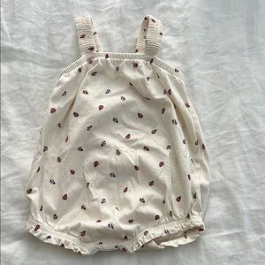 Cream Baby Romper with Ladybug Print